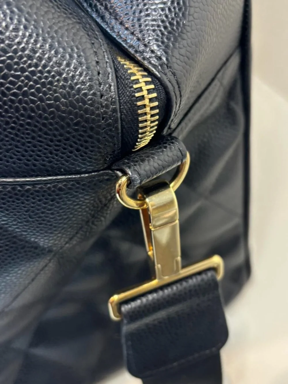 CHANEL Black Quilted Caviar Leather Tote with CC Emblem